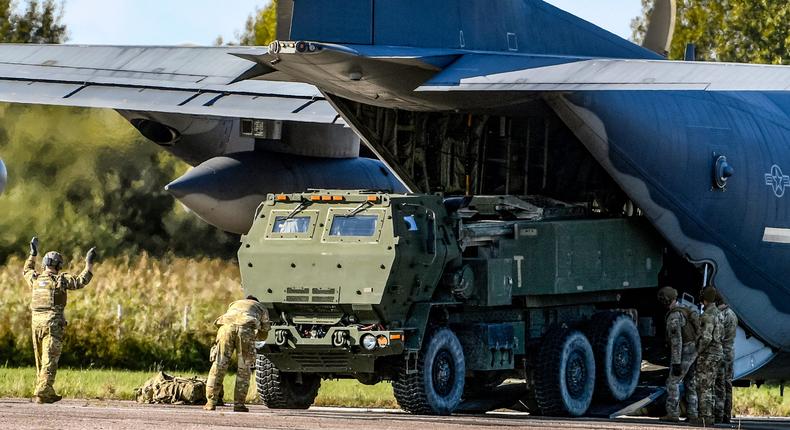 Soldiers load a High-Mobility Artillery Rocket System (HIMARS ) from a US Special Operations MC-130J aircraft during military exercises at Spilve Airport in Riga, Latvia, Monday, Sept. 26, 2022.AP Photo/Roman Koksarov