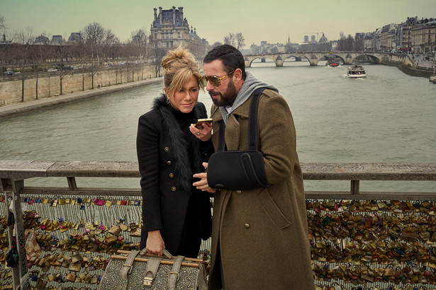 Murder Mystery 2. (L-R) Jennifer Aniston as Audrey Spitz and Adam Sandler as Nick Spitz in Murder Mystery 2. Cr. Scott Yamano/Netflix Â© 2023.