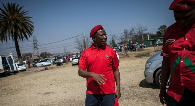 South African opposition leader Julius Malema arrives to give a press briefing in Johannesburg, South Africa