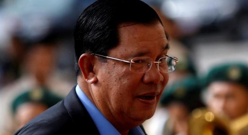 Cambodia PM shrugs off EU aid threat, opposition supporters jailed