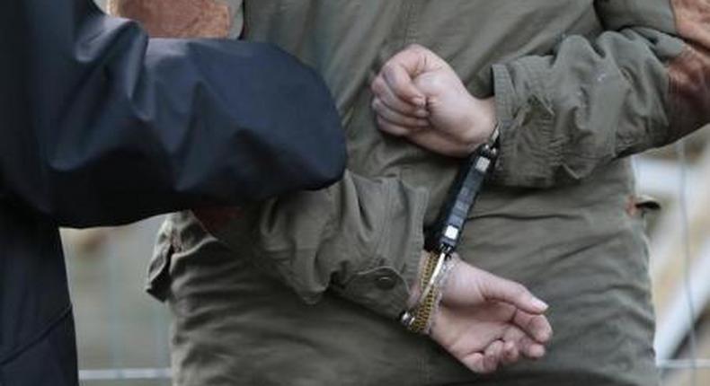 A police officer makes an arrest in a file photo.