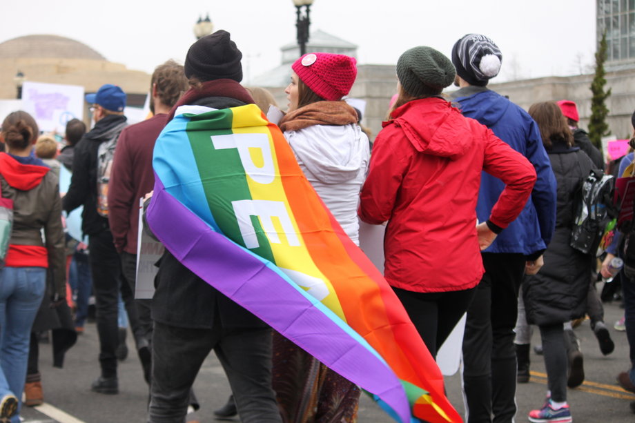 A protester wears a rainbow cape at the Women's March on Washington, January 21, 2017.