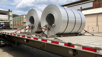 A trailer transporting steel coils