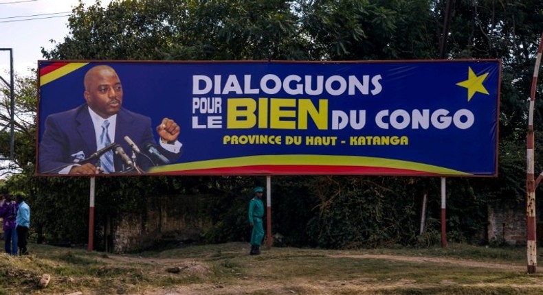 On a billboard in Lubumbashi, President Joseph Kabila urges Let's talk for the good of the Congo