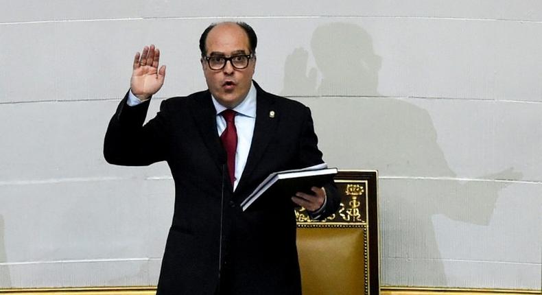 Opposition's parliamentary group leader Julio Borges swears-in as President of the National Assembly in Caracas