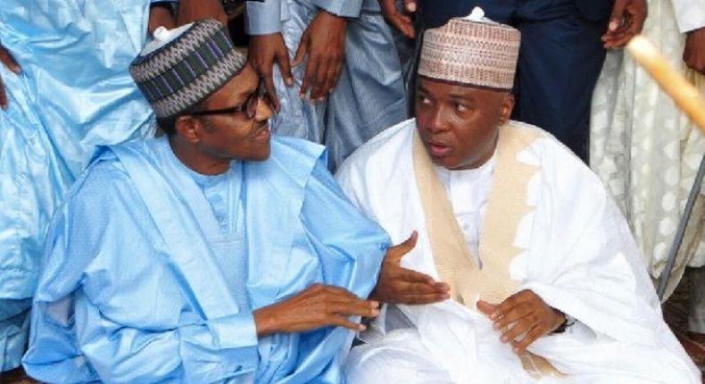 President Buhari (left) and former Senate President Saraki (Right) during prayers circa 2018 (Presidency) 