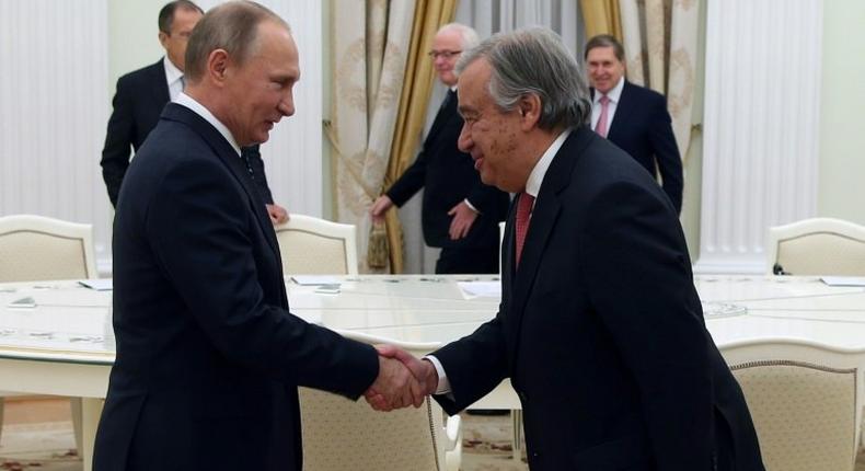 Russian President Vladimir Putin (left) shakes hands with UN Secretary-General designate Antonio Guterres during a meeting at the Kremlin in Moscow, on November 24, 2016