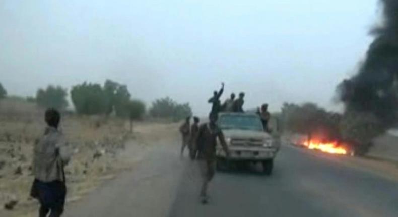 Dangerous roads: A screen grab from a January 2018 video released by Boko Haram, showing jihadists attacking the military on a highway near Maiduguri