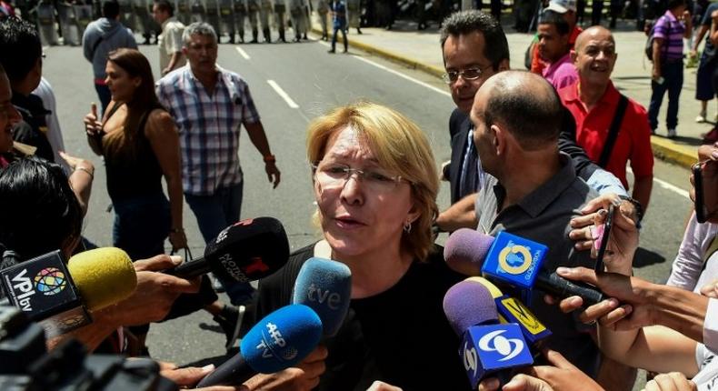 Venezuela's attorney general Luisa Ortega, one of President Nicolas Maduro's most vocal critics, speaks to the press during a flash visit to the Public Prosecutor's office in Caracas, on August 5, 2017