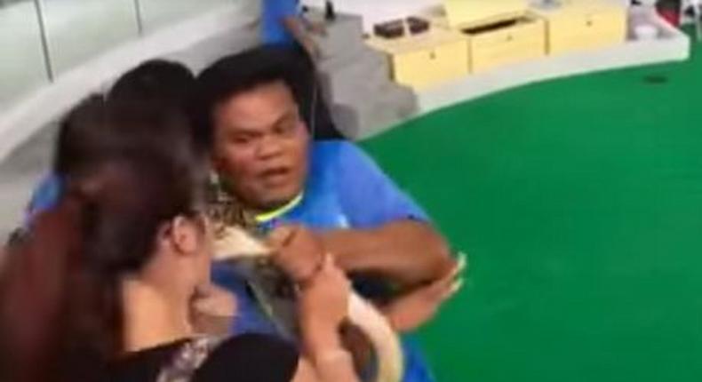 Woman bitten on the face by snake she attempts to kiss