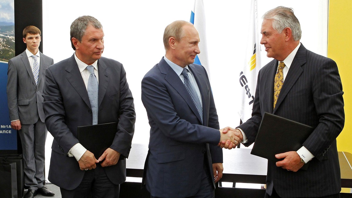 Russia's President Putin, Rosneft CEO Sechin and Exxon Mobil CEO Tillerson take part in signing cere