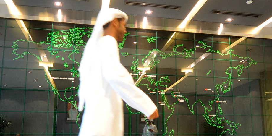 A screen displaying the worldwide locations of the National Bank of Abu Dhabi, at the bank's headquarters in Abu Dhabi.