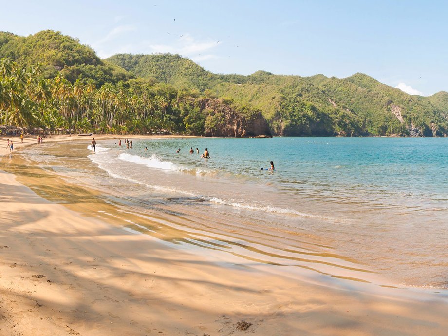 In Playa Medina, located on the Paria Peninsula in Venezuela, blue water and white sand combined with lush olive groves and coconut palms create a breathtaking sight. There are inns located towards the end of the beach, as well as lots of fresh seafood options to indulge in after a swim.