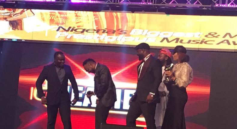 Kcee, Harysong on stage at the Headies 2016.