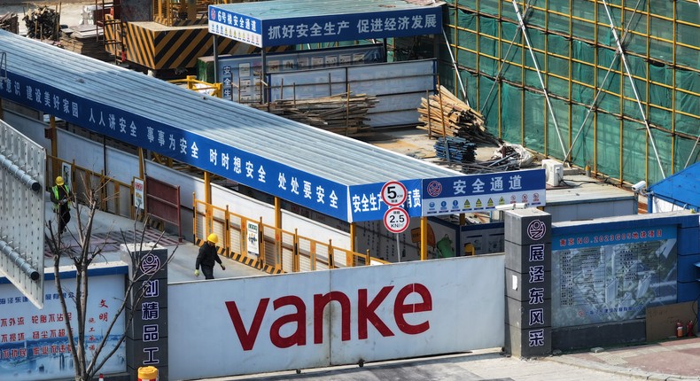 Workers inside the construction site of a residential project developed by Vanke in Nanjing in east China's Jiangsu province.Fang DongXu/Feature China/Future Publishing/Getty Images)