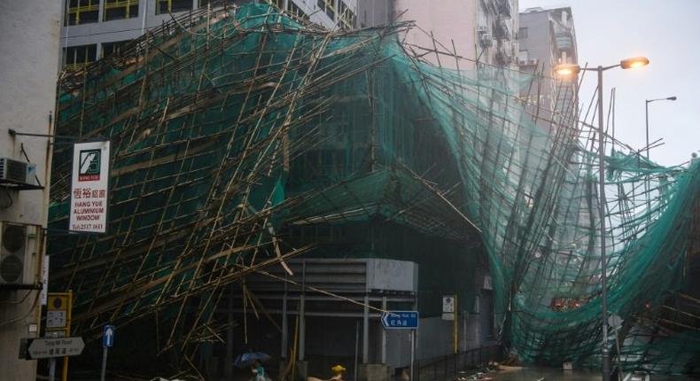 Hong Kong weather authorities issued their maximum alert for the storm, which hit the city with gusts of more than 230 kilometres per hour (142 mph) and left 213 people injured, according to government figures