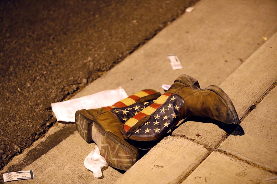 A pair of cowboy boots is shown in the street outside the concert venue on the Las Vegas Strip October 1, 2017.