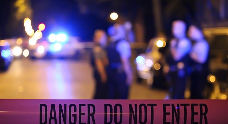 Chicago police guard a homicide scene.