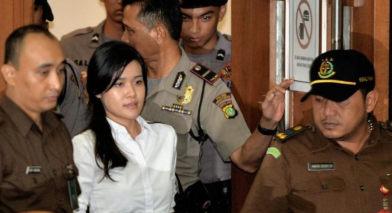 Indonesian Jessica Kumala Wongso (2L) was found guilty of murdering murdering her college friend with poisoned coffee at an upmarket cafe