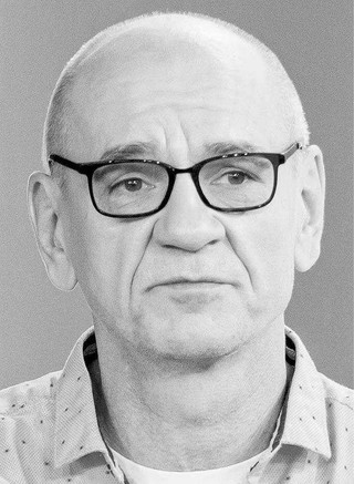 Dariusz Rosiak, dziennikarz radiowy i prasowy, główny prowadzący podcastu „Raport o stanie świata”