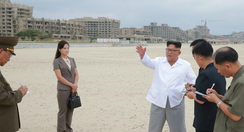 North Korean leader Kim Jong Un (3rd R) visited the resort at least three times last year according to state media