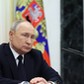 Russian President Vladimir Putin meets Transport Minister