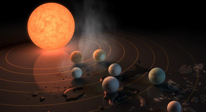 An artist's concept of the TRAPPIST-1 star, an ultracool red dwarf with seven Earth-size planets orbiting it.