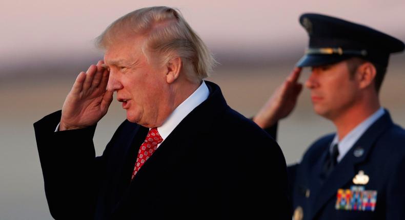 President Donald Trump arrives aboard Air Force One, as he returns to Washington from a weekend in Florida, at Joint Base Andrews, Maryland, March 5, 2017.