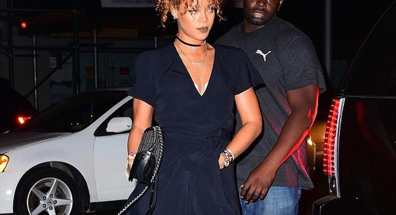 Pop singer, Rihanna, stepped out in thigh high strap heels