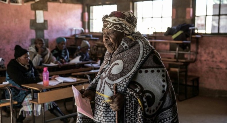 A woman votes during Lesotho's June general election, the landlocked kingdom's second snap poll in three years