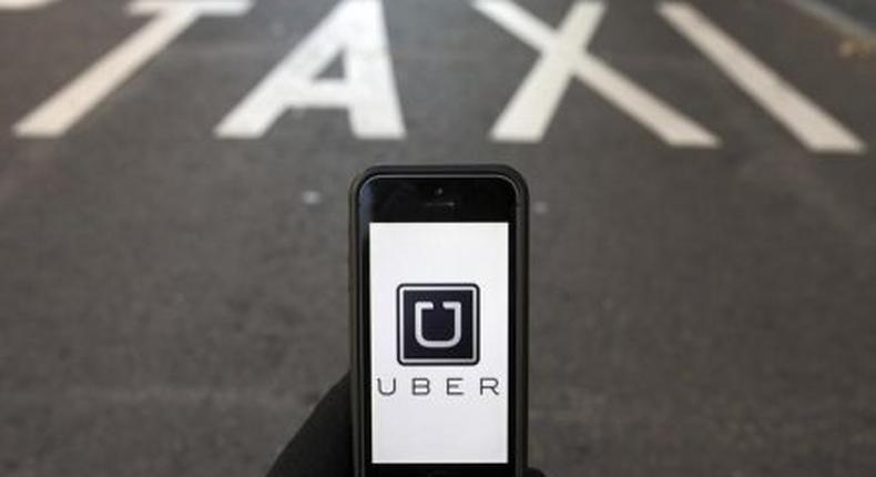 Three Goldman bankers leave for Uber as tech world raids Wall St talent