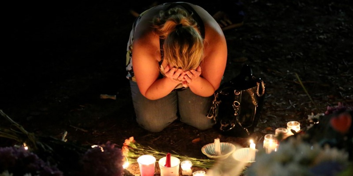 A woman taking part in a vigil for the Pulse nightclub victims after the shooting in Orlando, Florida.