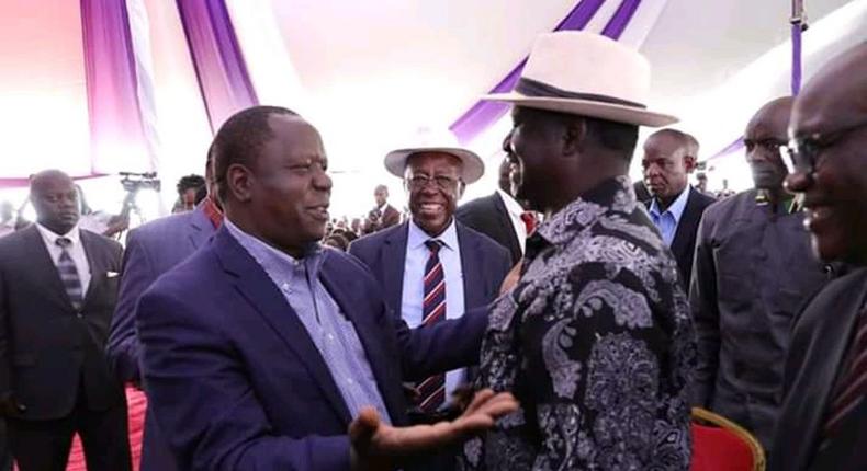 Interior Cabinet Secretary Dr Fred Matiangi having a chat with ODM leader Raila Odinga at a past event