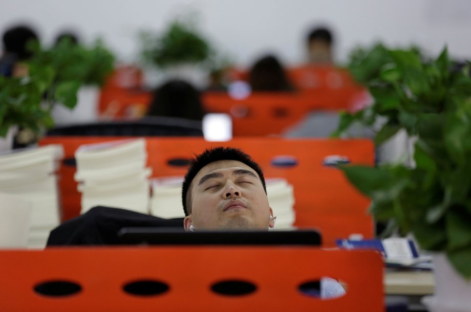 Even the co-founders find time to sleep — here, Goopal co-founder Cui Meng naps in his seat after lunch.