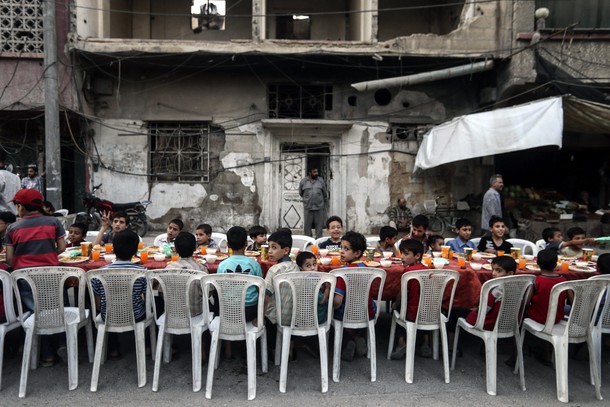 Iftar on a destroyed street in Douma 