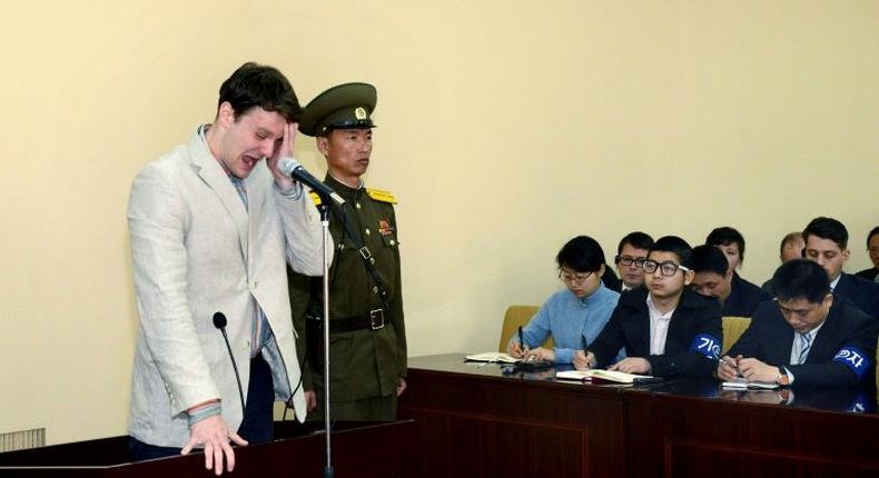 US student Otto Frederick Warmbier, who was sentenced last year to 15 years of hard labor for stealing a political banner from a hotel, stands on trial at the Supreme Court in Pyongyang on March 16, 2016