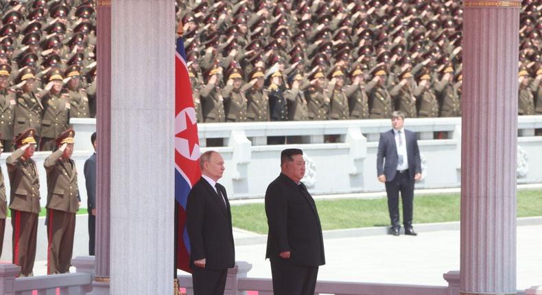 Russian President Vladimir Putin (C-L) and North Korean Supreme Leader Kim Jong Un attend a welcoming ceremony on June 19, 2024 in Pyongyang, North Korea.Contributor via Getty Images