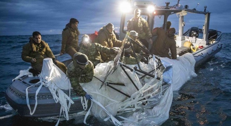 Sailors assigned to Explosive Ordnance Disposal Group 2 recover a high-altitude surveillance balloon off the coast of Myrtle Beach, South Carolina, Feb. 5, 2023.Petty Officer 1st Class Tyler Thompson