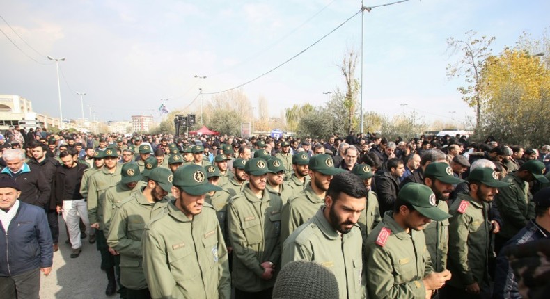 Members of Iran's Islamic Revolutionary Guard Corps (IRGC) take part in a demonstration against American crimes in Tehran on January 3, 2020 following the killing of Iranian Revolutionary Guards Major General Qasem Soleimani in a US strike