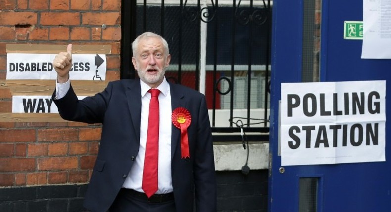 Britain's main opposition Labour Party leader Jeremy Corbyn casts his vote in the general election as forecasters struggle to predict the outcome