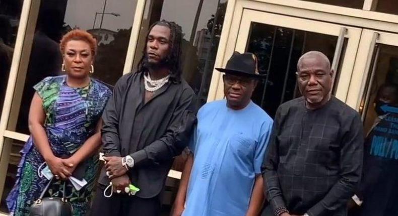 Burna Boy and his mom are received by Rivers Governor Nyesom Wike on Saturday, March 27, 2021 (Punch)