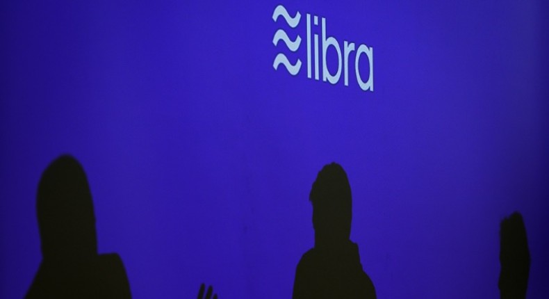 Executives involved with Facebook's proposed Libra digital currency say they will work with regulators to address their concerns