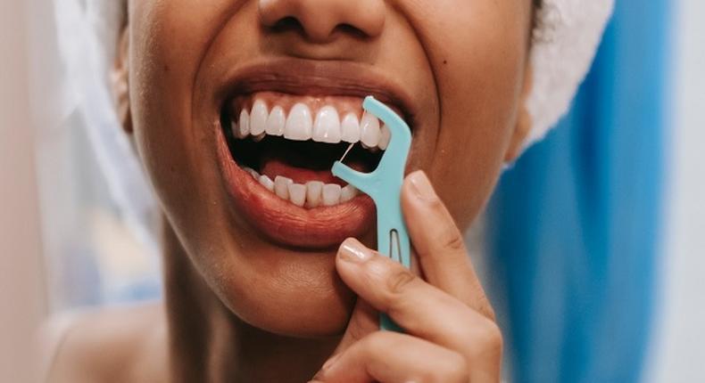 Flossing gets rid of food and plaque between your teeth