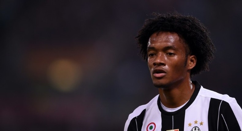 Juventus' midfielder from Colombia Juan Cuadrado looks on during the Italian Serie A football match Roma vs Juventus, on May 14, 2017