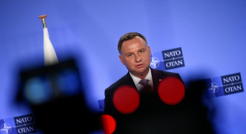 Polish President Andrzej Duda, seen speaking at a NATO conference in June, has pushed strongly for a permanent US military presence in his country