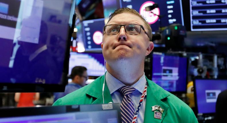 Trader Ryan Falvey works on the floor of the New York Stock Exchange, Thursday, May 9, 2019. Stocks are opening broadly lower on Wall Street as investors keep a close eye on trade talks between the U.S. and China. (AP Photo/Richard Drew)