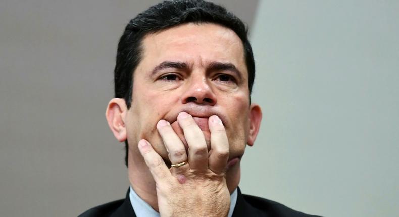 Brazilian Justice Minister and former judge Sergio Moro gestures during a hearing at Senate's Constitution and Justice Comission in Brasilia on June 19, 2019