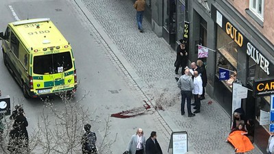 Ambulance in a street near the site were a truck was driving into a crowd in central Stockholm