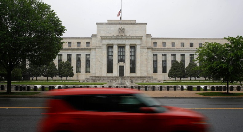 In this May 22, 2020, file photo, a car drives past the Federal Reserve building in Washington.Patrick Semansky/AP Photo