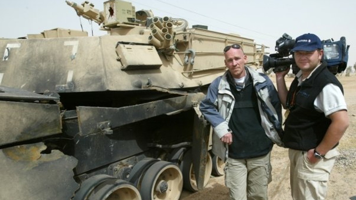 178448_sudbineirak--pored-unistenog-americkog-tenka